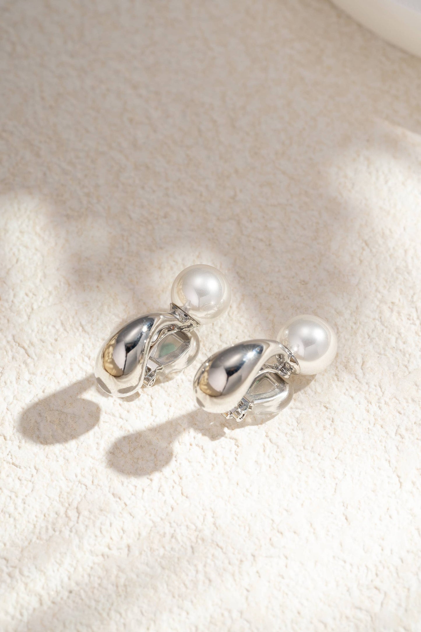 Belle White Pearl Clip-On Earrings Smooth Metal Drop Design