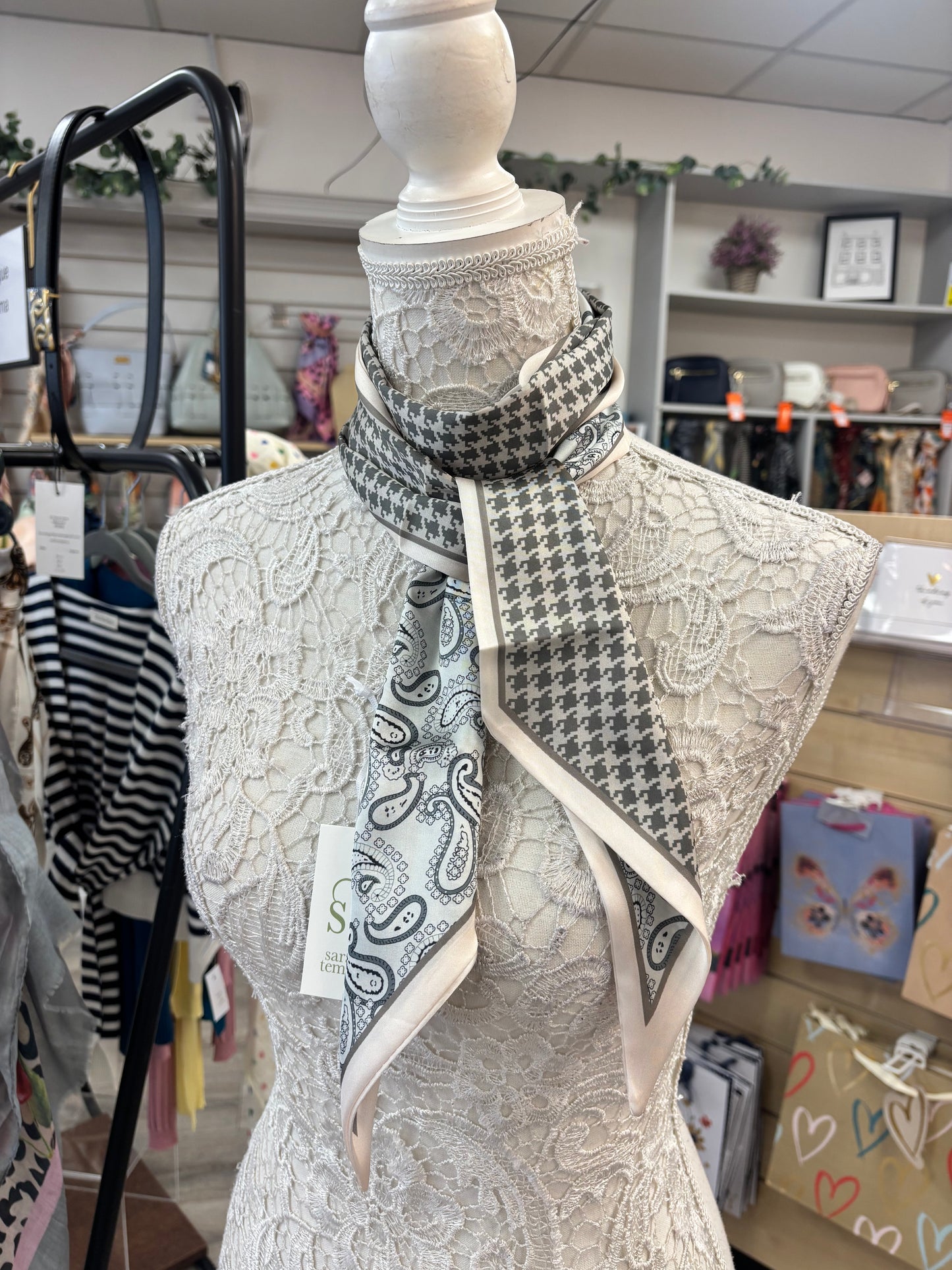 Dog tooth print on reverse silk feel scarf with ribbon finished edge