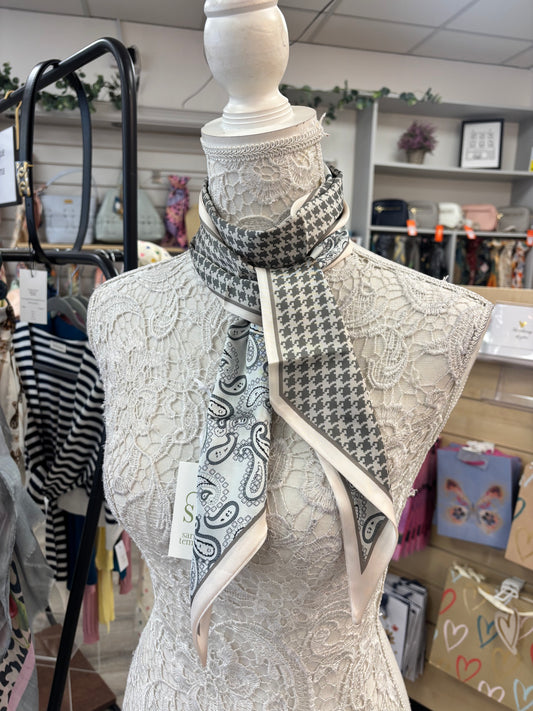 Dog tooth print on reverse silk feel scarf with ribbon finished edge