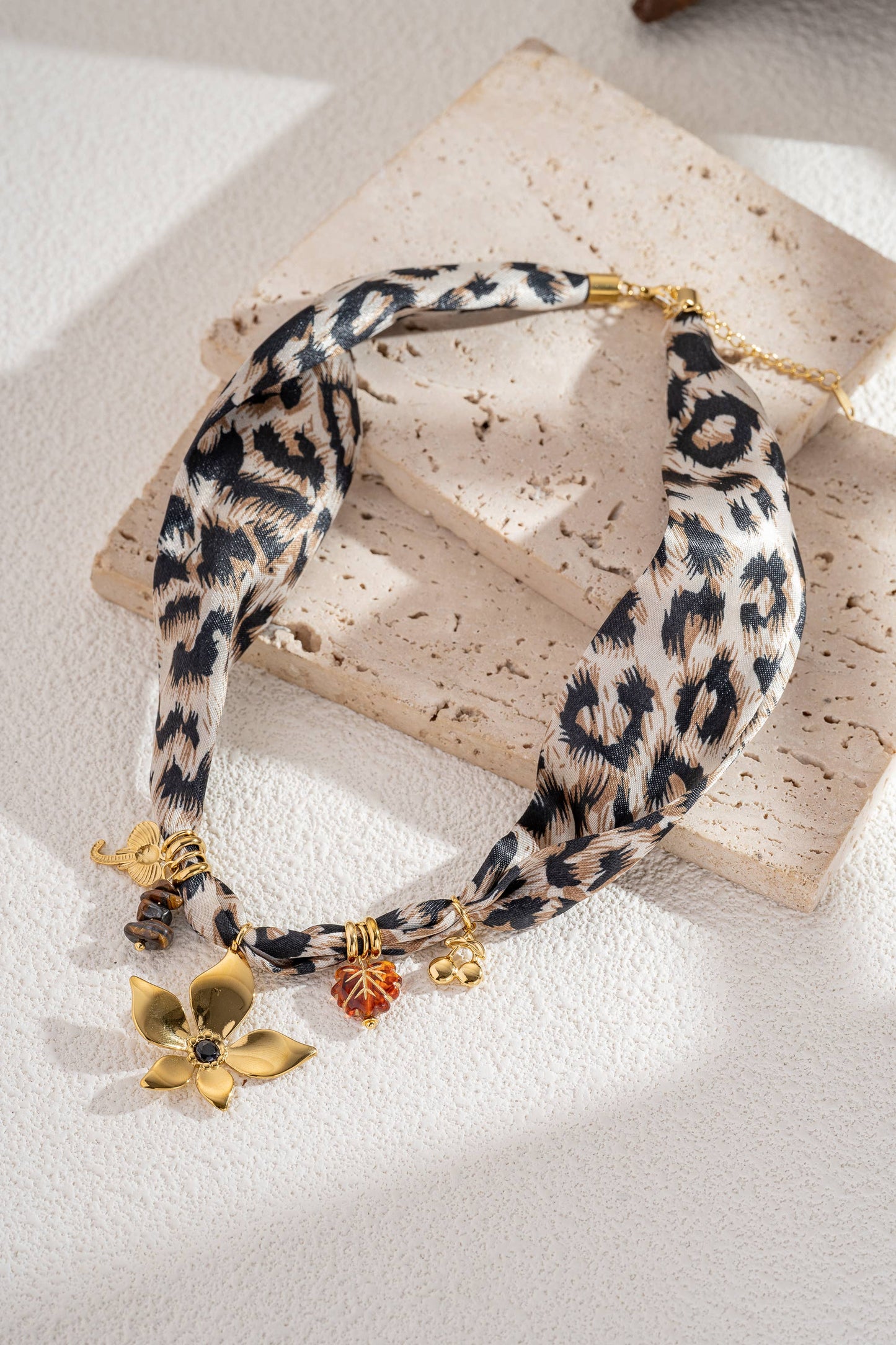 Kenza Leopard necklace in fabric and stainless steel, gold charms