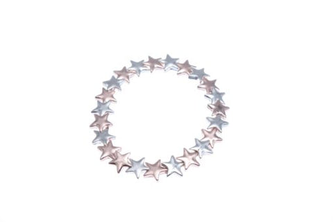 Stretch bracelet made up of shiny silver and rose gold stars